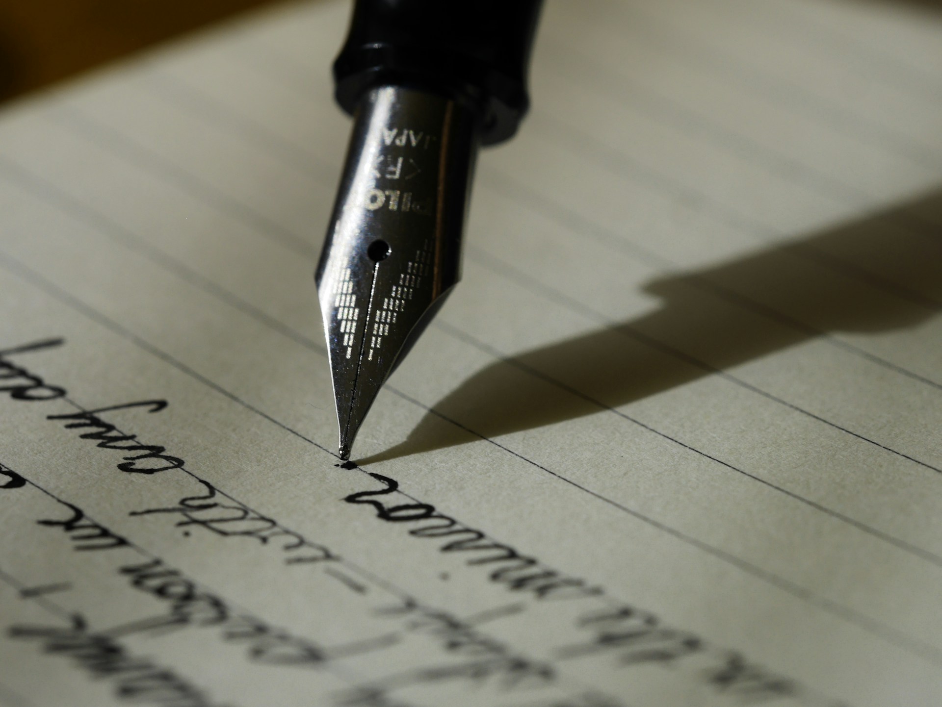 Close-up of a marked-up page with pencil and margin notes